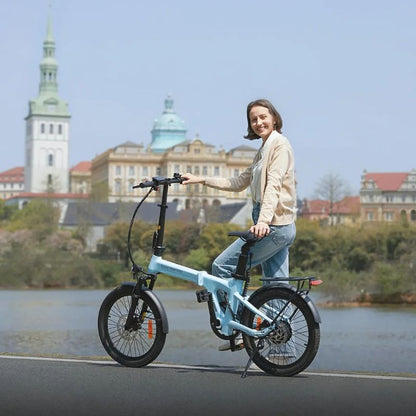Rider standing with ADO Air 20 Pro in blue by a riverside with city skyline